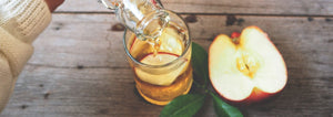 apple cider poured into a glass