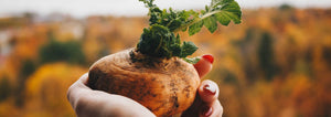 woman holding a turnip