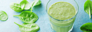 green smoothie with spinach leaves