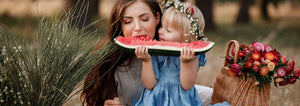 Daughter Feeding Mom Watermelon