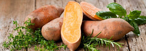 sweet potato on wood background