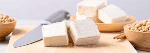 blocks of tofu on a cutting board