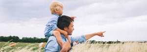 father and son in field